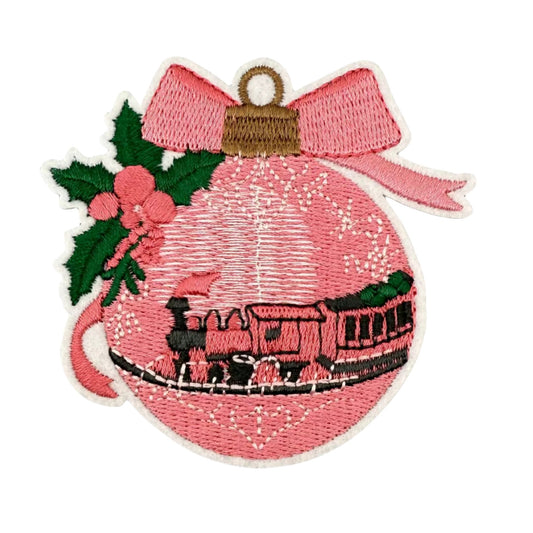Christmas Bauble Patch (7.9 x 7.7 cm) – Pink Embroidered Ornament Iron-On with Train & Holly